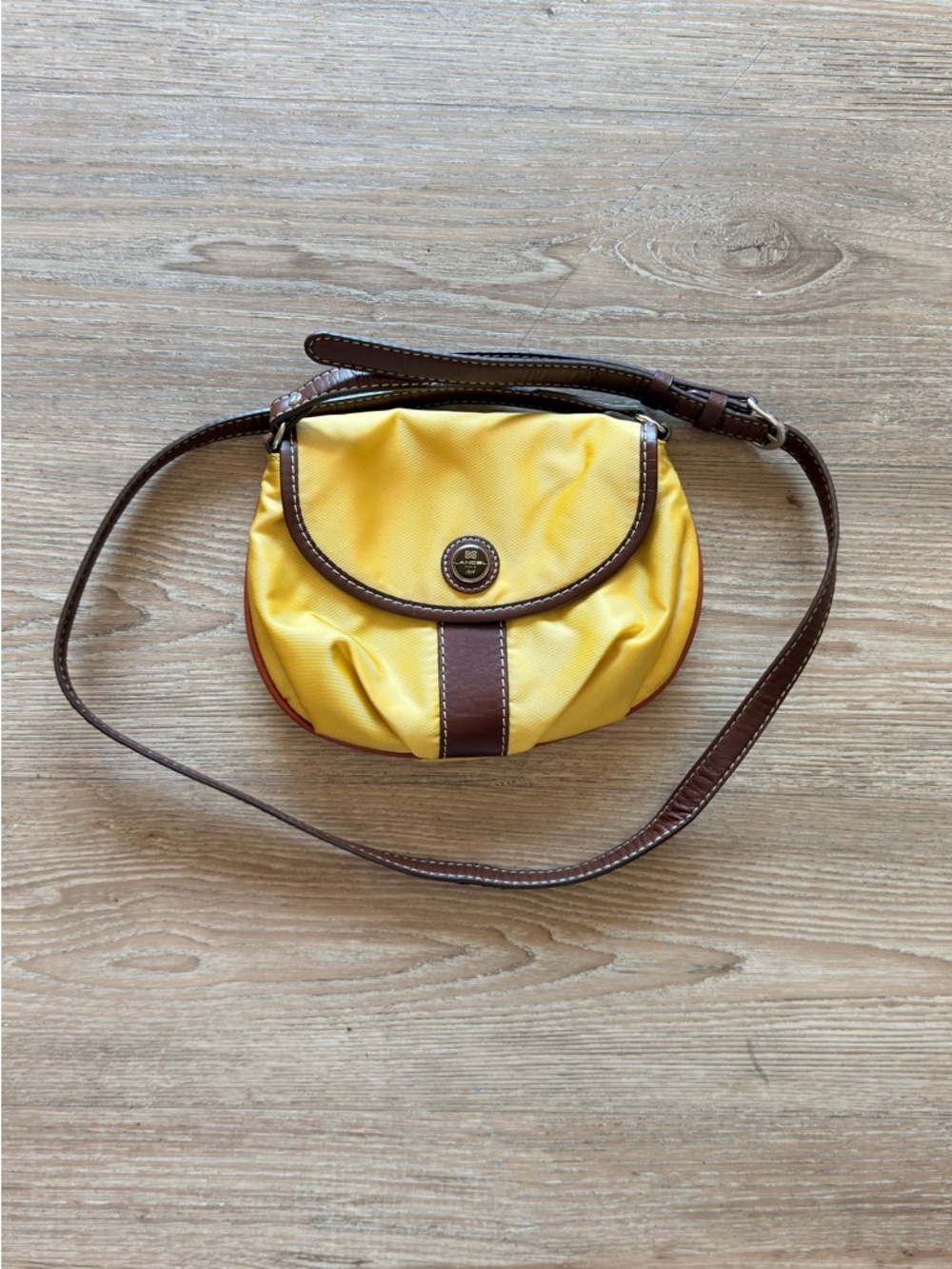 Vintage Yellow Crossbody Bag with Brown Trim and Adjustable Strap